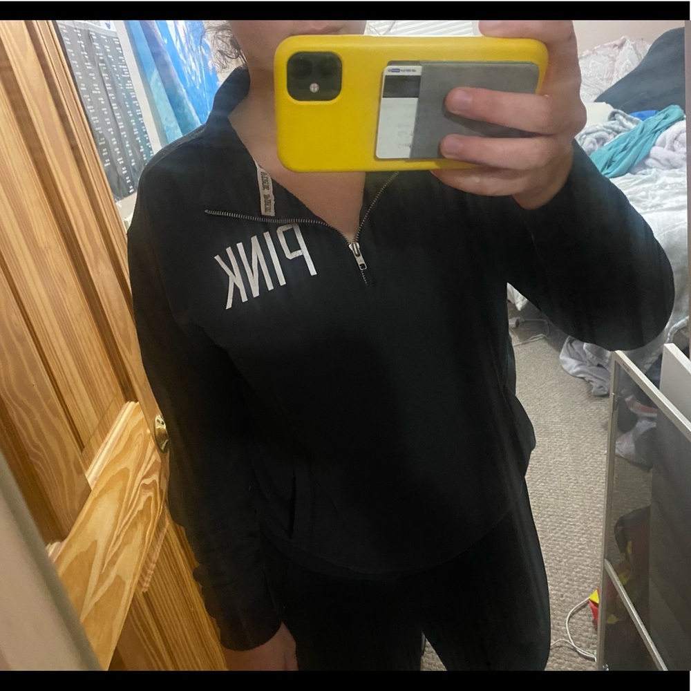 Pink quarter-zip sweatshirt